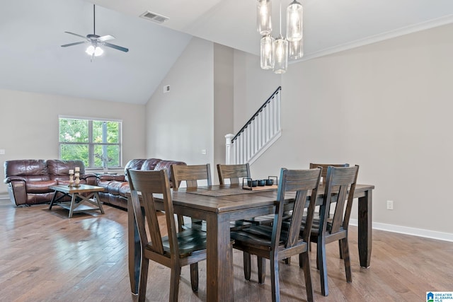 5182 Park Side Cir, Hoover, AL 35244 - dining space featuring high vaulted ceiling, light wood-type flooring, stairs, and ceiling fan