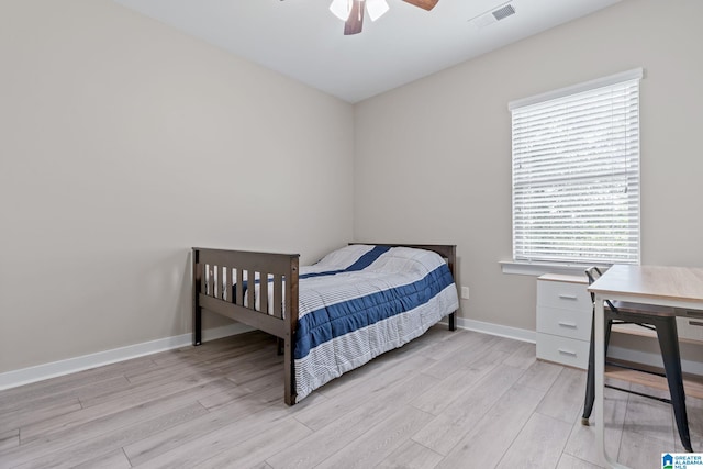 5182 Park Side Cir, Hoover, AL 35244 - bedroom with light wood-style floors and a ceiling fan