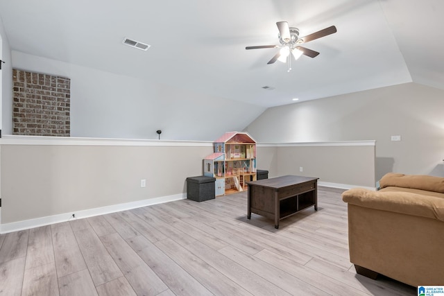 5182 Park Side Cir, Hoover, AL 35244 - living room with a ceiling fan, vaulted ceiling, and wood finished floors