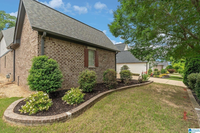 5182 Park Side Cir, Hoover, AL 35244 - view of side of property with brick siding, a shingled roof, and a lawn