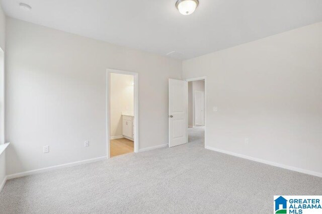2029 Valley Run, Leeds, AL 35094 - unfurnished bedroom featuring carpet, baseboards, and ensuite bath