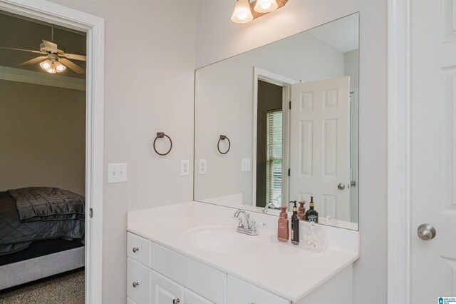 1166 Eagle Dr, Maylene, AL 35114 - bathroom with vanity, ensuite bath, a ceiling fan, and crown molding