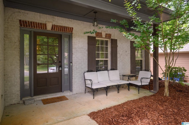 1166 Eagle Dr, Maylene, AL 35114 - doorway to property with brick siding and covered porch