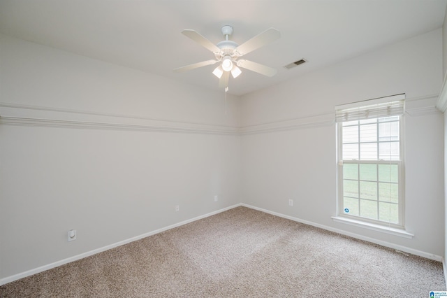 1166 Eagle Dr, Maylene, AL 35114 - carpeted empty room featuring plenty of natural light and a ceiling fan