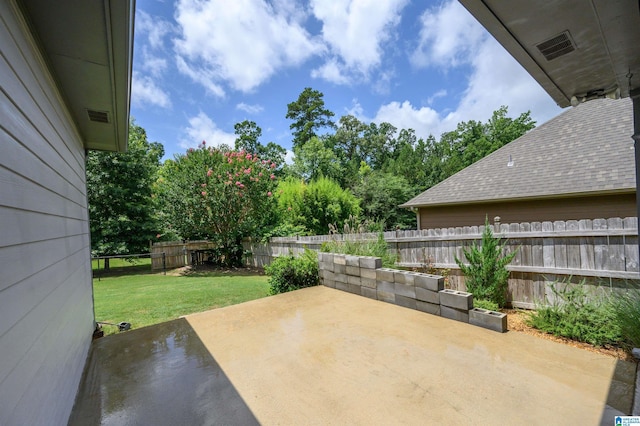 1166 Eagle Dr, Maylene, AL 35114 - fenced backyard with a patio
