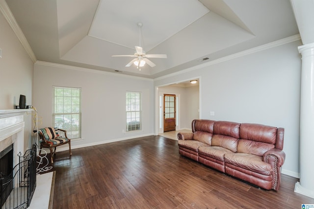 1166 Eagle Dr, Maylene, AL 35114 - living area with a raised ceiling, a ceiling fan, a premium fireplace, wood finished floors, and crown molding