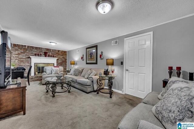 3303 Carousel Dr, Fultondale, AL 35068 - carpeted living area featuring a textured ceiling and a fireplace
