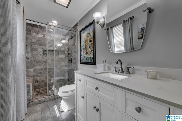 3303 Carousel Dr, Fultondale, AL 35068 - bathroom with crown molding, a stall shower, and vanity