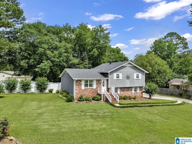 3303 Carousel Dr, Fultondale, AL 35068 - split level home featuring brick siding and a shingled roof