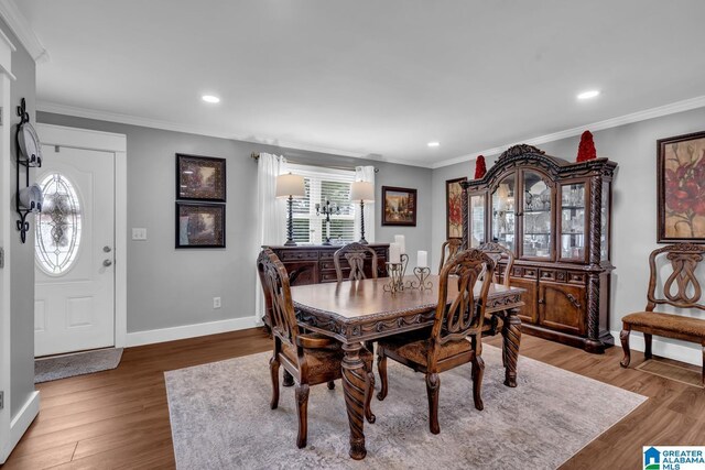 3303 Carousel Dr, Fultondale, AL 35068 - dining space with ornamental molding, wood finished floors, and recessed lighting