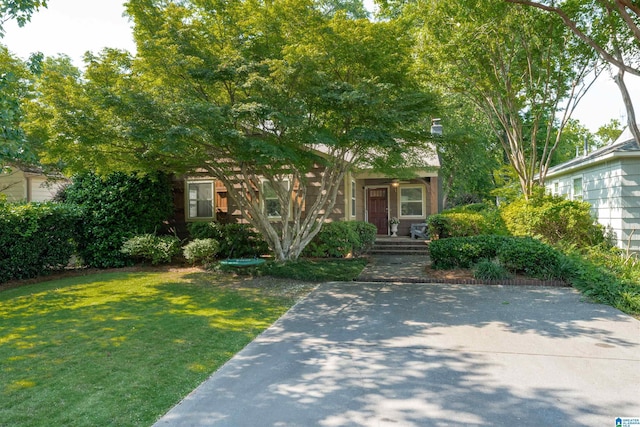 326 Lathrop Ave, Homewood, AL 35209 - obstructed view of property with a front yard and covered porch