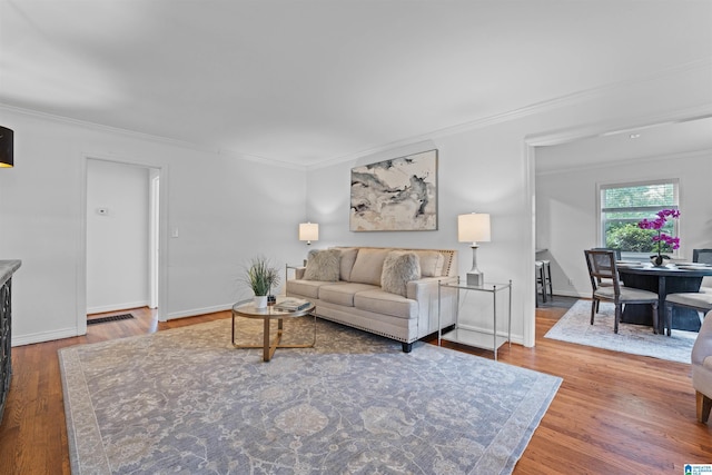 326 Lathrop Ave, Homewood, AL 35209 - living room featuring ornamental molding and wood finished floors