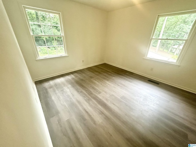 3583 Valley Cir, Vestavia Hills, AL 35243 - unfurnished room with dark wood-style flooring and baseboards