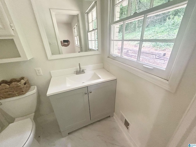 3583 Valley Cir, Vestavia Hills, AL 35243 - half bathroom with healthy amount of natural light and vanity