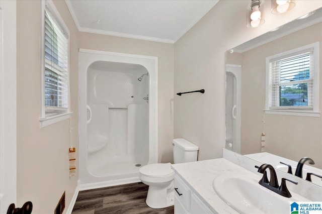 2009 Palmer Ave, Leeds, AL 35094 - full bath featuring toilet, a shower, vanity, wood finished floors, and ornamental molding