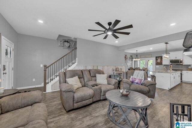 1515 Baxter Ave, Springville, AL 35146 - living area with a ceiling fan, wood finished floors, stairs, a chandelier, and recessed lighting