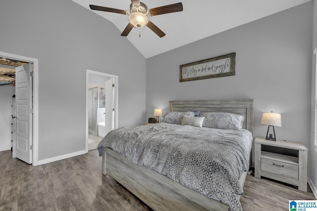 1515 Baxter Ave, Springville, AL 35146 - bedroom with high vaulted ceiling, wood finished floors, baseboards, a spacious closet, and ceiling fan