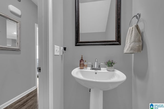 1515 Baxter Ave, Springville, AL 35146 - bathroom with wood finished floors and baseboards