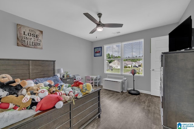 1515 Baxter Ave, Springville, AL 35146 - bedroom featuring wood finished floors, baseboards, and a ceiling fan