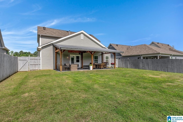 1515 Baxter Ave, Springville, AL 35146 - back of property featuring a patio area and a gate