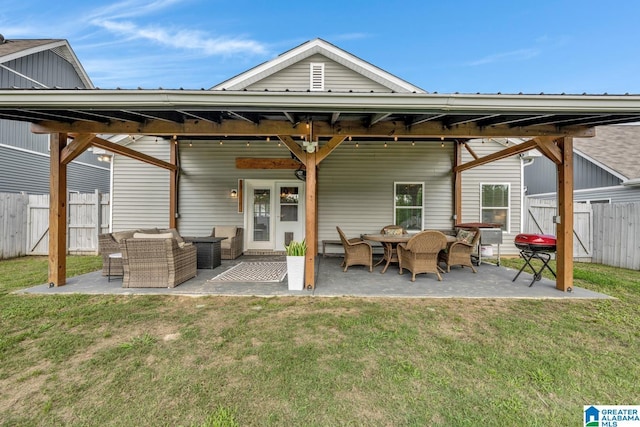 1515 Baxter Ave, Springville, AL 35146 - rear view of house featuring a patio and outdoor lounge area