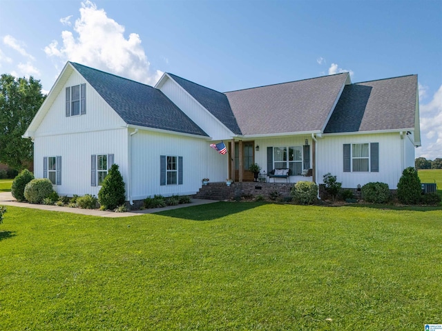 175 Bayview Ln, Centre, AL 35960 - view of front facade with a shingled roof, a front yard, and cooling unit