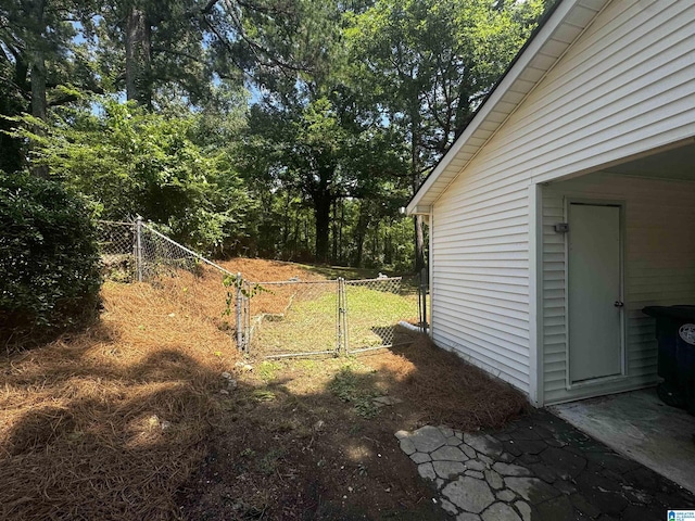 1225 Lynn Acres Dr, Birmingham, AL 35215 - view of yard featuring a gate