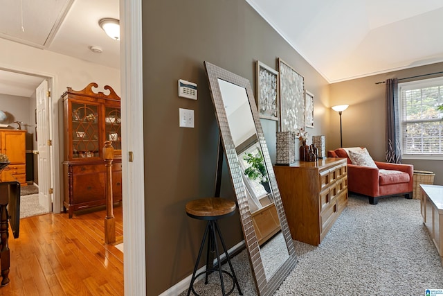 1963 Russet Hill Ln, Hoover, AL 35244 - hallway with attic access, light wood-style flooring, and ornamental molding