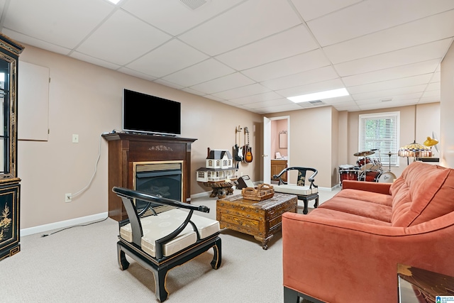 1963 Russet Hill Ln, Hoover, AL 35244 - living area featuring a glass covered fireplace, a paneled ceiling, and carpet