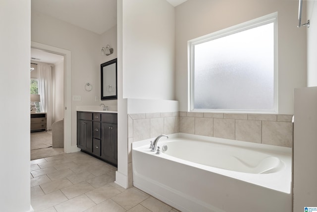 3024 Camellia Ridge Ct, Pelham, AL 35124 - bathroom with vanity, a bath, and tile patterned flooring