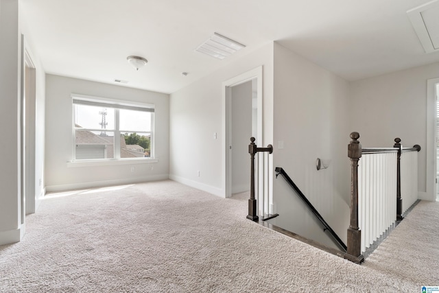 3024 Camellia Ridge Ct, Pelham, AL 35124 - carpeted empty room featuring attic access and baseboards