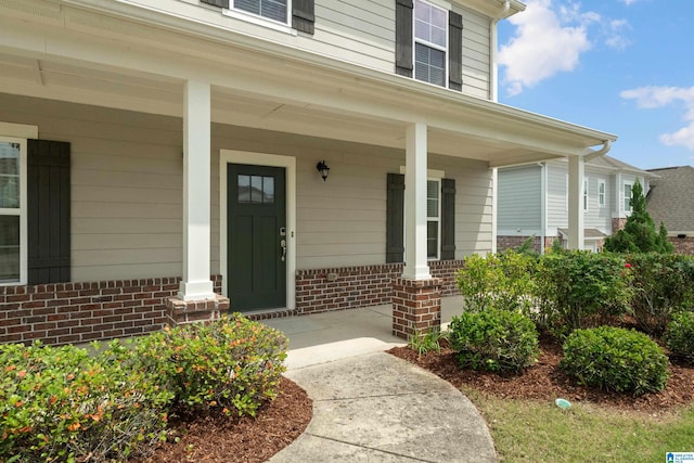 3024 Camellia Ridge Ct, Pelham, AL 35124 - view of exterior entry featuring a porch and brick siding