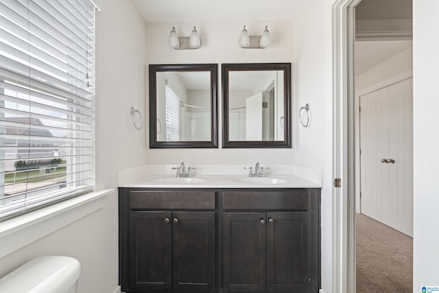 3024 Camellia Ridge Ct, Pelham, AL 35124 - full bath featuring double vanity and toilet