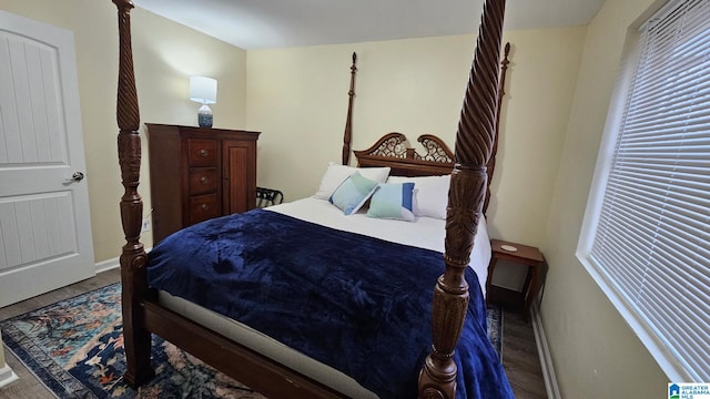 14187 Al Highway 22, Rockford, AL 35136 - bedroom with wood finished floors and baseboards
