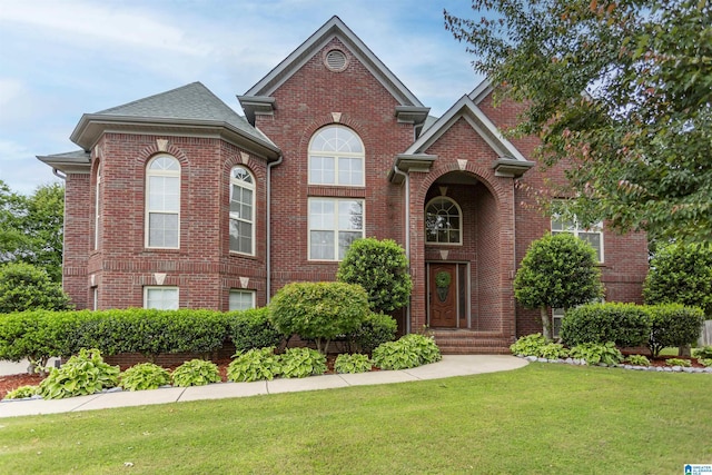 295 Homestead Dr, Cropwell, AL 35054 - view of front of home with a front yard and brick siding
