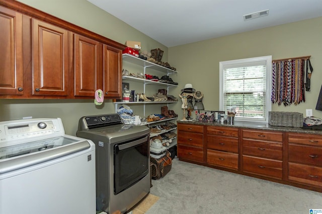 295 Homestead Dr, Cropwell, AL 35054 - laundry area with washer and dryer, cabinet space, and light carpet