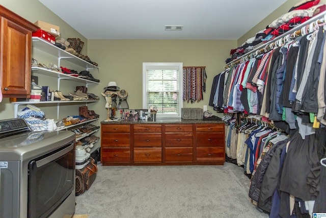 295 Homestead Dr, Cropwell, AL 35054 - walk in closet featuring light colored carpet and separate washer and dryer