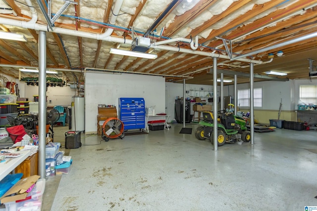 295 Homestead Dr, Cropwell, AL 35054 - garage with gas water heater and a garage door opener