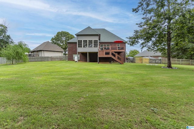 295 Homestead Dr, Cropwell, AL 35054 - rear view of property featuring stairway, a fenced backyard, a deck, and a sunroom
