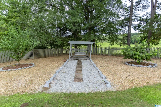 295 Homestead Dr, Cropwell, AL 35054 - fenced backyard featuring a carport