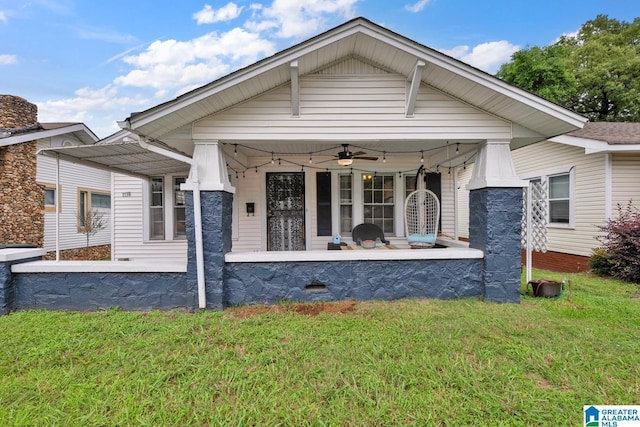 1138 14th Ave S, Birmingham, AL 35205 - view of front of property featuring a ceiling fan and a front lawn