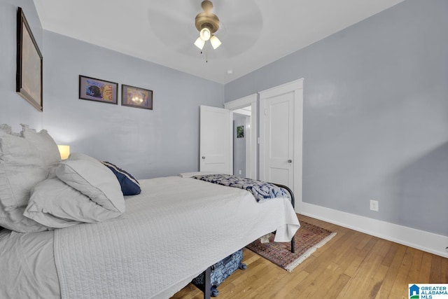 1138 14th Ave S, Birmingham, AL 35205 - bedroom featuring hardwood / wood-style flooring, baseboards, and ceiling fan