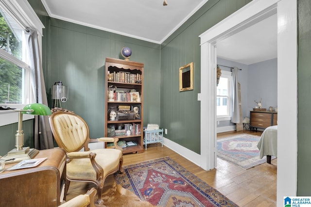 1138 14th Ave S, Birmingham, AL 35205 - sitting room with wood finished floors, crown molding, and baseboards