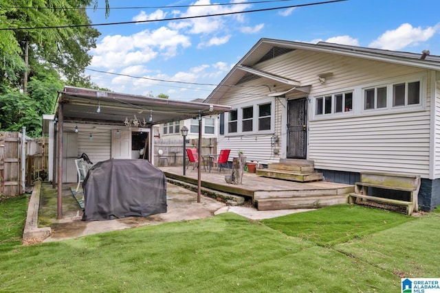 1138 14th Ave S, Birmingham, AL 35205 - back of property with a wooden deck