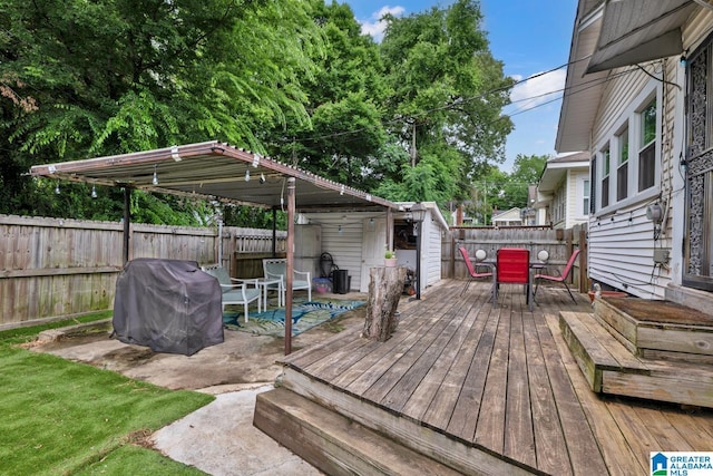 1138 14th Ave S, Birmingham, AL 35205 - wooden terrace featuring outdoor dining area, a fenced backyard, and grilling area