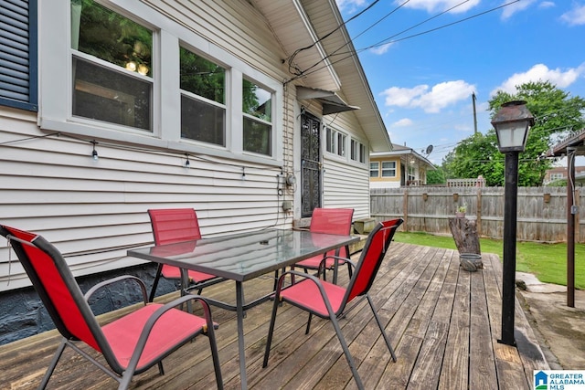 1138 14th Ave S, Birmingham, AL 35205 - wooden deck featuring outdoor dining area