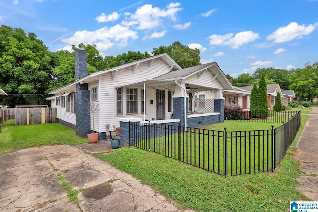 1138 14th Ave S, Birmingham, AL 35205 - bungalow featuring covered porch and a chimney