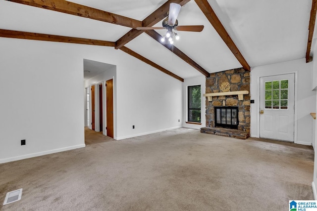 1117 Oak Creek Trl NE, Pinson, AL 35215 - unfurnished living room with ceiling fan, carpet floors, and a stone fireplace