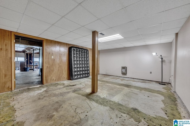 1117 Oak Creek Trl NE, Pinson, AL 35215 - basement featuring a paneled ceiling and wooden walls