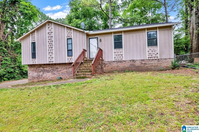 1117 Oak Creek Trl NE, Pinson, AL 35215 - view of front of house featuring brick siding, entry steps, and board and batten siding